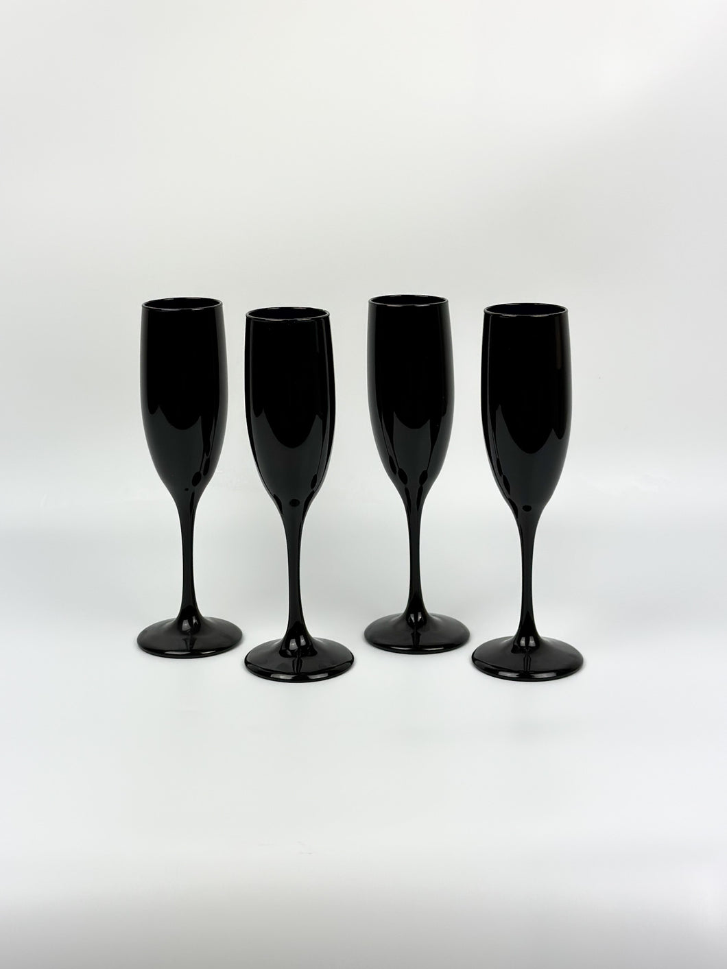 Set of 4 Vintage Black Glass Champagne Flutes